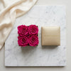 Cajas de rosas La Mini Dorada PINK 2 de la marca BELLE FLEUR ECUADOR, con arreglos florales en tonos rosados.
