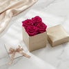 Cajas de rosas La Mini Dorada PINK 2 de BELLE FLEUR ECUADOR, con elegantes flores rosas en una caja decorativa.