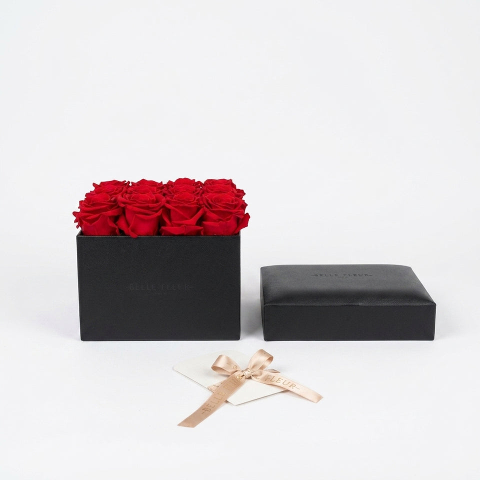 Cajas de rosas La Midi Negra Rojo de BELLE FLEUR ECUADOR, elegantes y decorativas en tonos negros y rojos.