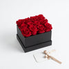 Cajas de rosas La Midi Negra Rojo de BELLE FLEUR ECUADOR, presentación elegante con flores rojas en caja negra.