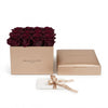 Cajas de rosas La Midi Gold Rose Morado de BELLE FLEUR ECUADOR, con rosas moradas en una elegante caja dorada.
