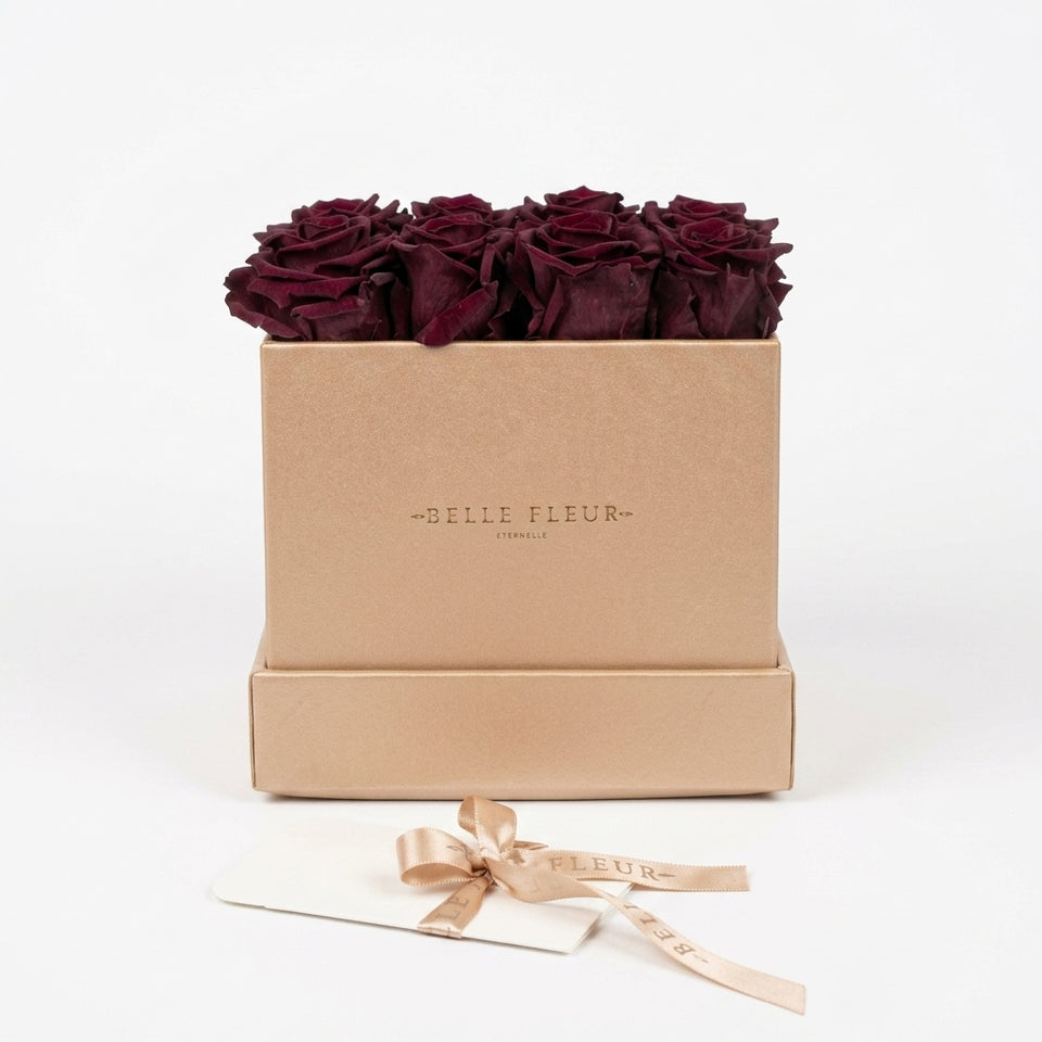 Cajas de rosas La Midi Gold Rose Morado de BELLE FLEUR ECUADOR, con rosas moradas en elegante caja decorativa.