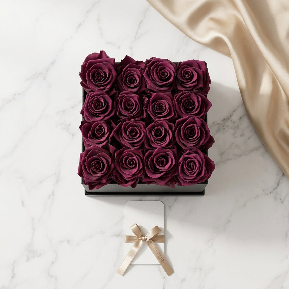 Cajas de rosas La Grand Negra Morado de BELLE FLEUR ECUADOR con elegantes flores moradas en una presentación hermosa.